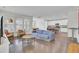 Open-concept living space featuring a comfortable sofa, modern decor, and a bright, airy atmosphere at 312 Greenhouse, Summerville, SC 29485