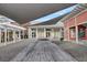 Outdoor dining with shaded tables, promoting a sense of community and casual gathering at 312 Greenhouse, Summerville, SC 29485