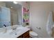 Clean bathroom with modern fixtures, a framed art piece, and neutral tones at 314 Freeland Way, Moncks Corner, SC 29461