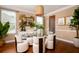 Bright dining room featuring modern decor and a glass table at 314 Freeland Way, Moncks Corner, SC 29461