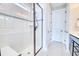 Bathroom features glass enclosed shower with white tiling, and tiled flooring at 344 Seaside Trl, Summerville, SC 29486