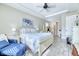 Bright bedroom features a ceiling fan, artwork, and wood look flooring at 344 Seaside Trl, Summerville, SC 29486