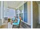 Cozy front porch featuring rocking chairs, decorative shutters, and a welcoming ambiance at 344 Seaside Trl, Summerville, SC 29486
