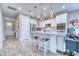 Bright kitchen with white cabinets, stainless steel appliances, a large island, and stylish pendant lights at 344 Seaside Trl, Summerville, SC 29486