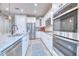 Modern kitchen featuring stainless steel appliances, granite countertops, and white cabinetry at 344 Seaside Trl, Summerville, SC 29486