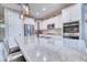 Bright kitchen featuring a large island with granite countertops, stainless steel appliances and pendant lighting at 344 Seaside Trl, Summerville, SC 29486