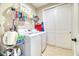 Laundry room features washer and dryer and shelving at 344 Seaside Trl, Summerville, SC 29486