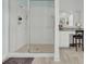 Modern bathroom featuring a glass enclosed shower with tiled walls and floor, and a vanity with a mirror at 351 Gnarly Oak Ln, Summerville, SC 29485