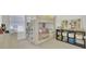 bedroom featuring a bunk bed and a dark shelf against a white wall and bright natural light at 351 Gnarly Oak Ln, Summerville, SC 29485