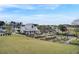 Charming exterior view of a neighborhood home with a manicured lawn and inviting landscaping at 351 Gnarly Oak Ln, Summerville, SC 29485