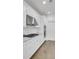Modern kitchen featuring stainless steel appliances, granite counters, ample cabinet space, and hardwood floors at 351 Gnarly Oak Ln, Summerville, SC 29485