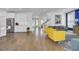 Open-concept living space with wood flooring, stylish furnishings, and bright, airy ambiance at 351 Gnarly Oak Ln, Summerville, SC 29485