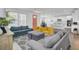 Spacious living area with an open floor plan, modern decor, and seamless flow to the kitchen at 351 Gnarly Oak Ln, Summerville, SC 29485