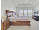 Spacious main bedroom with carpet, furnishings, and several windows at 351 Gnarly Oak Ln, Summerville, SC 29485
