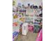 Well-organized pantry with wire shelving, storage containers, and a variety of food items at 351 Gnarly Oak Ln, Summerville, SC 29485