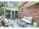 Inviting outdoor patio with comfortable seating and a beautiful view of the backyard at 3555 Colonel Vanderhorst Cir, Mount Pleasant, SC 29466