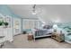 Charming bedroom featuring a light color scheme, vaulted ceilings, and ample natural light at 3555 Colonel Vanderhorst Cir, Mount Pleasant, SC 29466