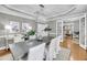 Inviting dining room with stylish decor, light fixtures, and a spacious table for gatherings at 3555 Colonel Vanderhorst Cir, Mount Pleasant, SC 29466