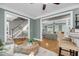 Open-concept living area with hardwood floors and views into the dining room and stairs at 3555 Colonel Vanderhorst Cir, Mount Pleasant, SC 29466