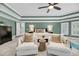 Relaxing main bedroom with comfortable seating, soft lighting, and a king-size bed at 3555 Colonel Vanderhorst Cir, Mount Pleasant, SC 29466