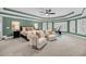 Serene main bedroom with exercise equipment, a sitting area, and a comfortable king bed at 3555 Colonel Vanderhorst Cir, Mount Pleasant, SC 29466