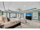 Spacious main bedroom with sitting area, large windows, plush carpet, and tray ceilings at 3555 Colonel Vanderhorst Cir, Mount Pleasant, SC 29466
