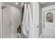 Elegant glass enclosed shower with marble tile and convenient towel racks at 3555 Colonel Vanderhorst Cir, Mount Pleasant, SC 29466