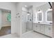 Elegant bathroom featuring double sinks, white subway tile shower and modern fixtures at 4067 S Rhett Ave, North Charleston, SC 29405