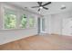 Bedroom with natural light, hardwood floors, and access to the outdoors at 4067 S Rhett Ave, North Charleston, SC 29405