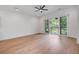 Spacious bedroom with hardwood floors and sliding doors to balcony at 4067 S Rhett Ave, North Charleston, SC 29405