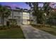 Charming townhomes featuring a driveway and gray siding, creating a welcoming and modern curb appeal at 4067 S Rhett Ave, North Charleston, SC 29405