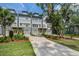 Contemporary townhomes offer multi-car garages, modern design, and a manicured lawn at 4067 S Rhett Ave, North Charleston, SC 29405