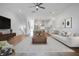 Bright, open-concept living space featuring hardwood floors, modern furnishings, and lots of natural light at 4067 S Rhett Ave, North Charleston, SC 29405