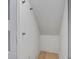 Angled closet features wooden floors and ample storage for coats and outdoor accessories at 4067 S Rhett Ave, North Charleston, SC 29405