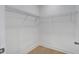 Walk-in closet with wire shelving and wood flooring at 4067 S Rhett Ave, North Charleston, SC 29405