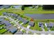 Aerial view of the home in a neighborhood with a beautiful view of the lake and amenity center at 470 Sanctuary Park Dr, Summerville, SC 29486