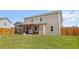 View of the home's screened porch, pergola with grill, and expansive backyard at 470 Sanctuary Park Dr, Summerville, SC 29486