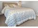 Well-lit bedroom featuring neutral tones, a plush bed, and ample space for relaxation and comfort at 470 Sanctuary Park Dr, Summerville, SC 29486