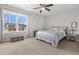 Charming bedroom with a large window offering plenty of natural light, creating a warm and inviting atmosphere at 470 Sanctuary Park Dr, Summerville, SC 29486