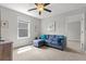 Cozy bonus room featuring comfortable seating, natural light, and a ceiling fan for added comfort and style at 470 Sanctuary Park Dr, Summerville, SC 29486