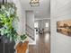 Welcoming foyer with wood floors, a staircase, and a view into the living room at 470 Sanctuary Park Dr, Summerville, SC 29486