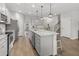 Spacious kitchen with white cabinets, granite countertops, and stainless steel appliances at 470 Sanctuary Park Dr, Summerville, SC 29486