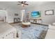 Bright living room with neutral tones, a large area rug, and comfortable seating at 470 Sanctuary Park Dr, Summerville, SC 29486