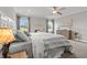 Main bedroom features lots of natural light, ceiling fan, and neutral color palette at 470 Sanctuary Park Dr, Summerville, SC 29486