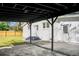 Covered patio area with views of the yard at 5259 Hartford Cir, North Charleston, SC 29405