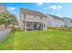 This home features a spacious backyard with a screened-in porch, great for relaxing outdoors at 531 Crossland Dr, Moncks Corner, SC 29461