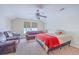 Bedroom featuring carpet, ceiling fan, seating area, and a window overlooking the front yard at 531 Crossland Dr, Moncks Corner, SC 29461