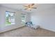 Bedroom featuring carpet, ceiling fan and a window overlooking the front yard at 531 Crossland Dr, Moncks Corner, SC 29461