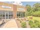 Modern commercial building featuring retail and fitness center spaces with well-maintained landscaping at 531 Crossland Dr, Moncks Corner, SC 29461