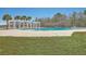 Community pool surrounded by palm trees, offering a relaxing outdoor space for residents at 531 Crossland Dr, Moncks Corner, SC 29461
